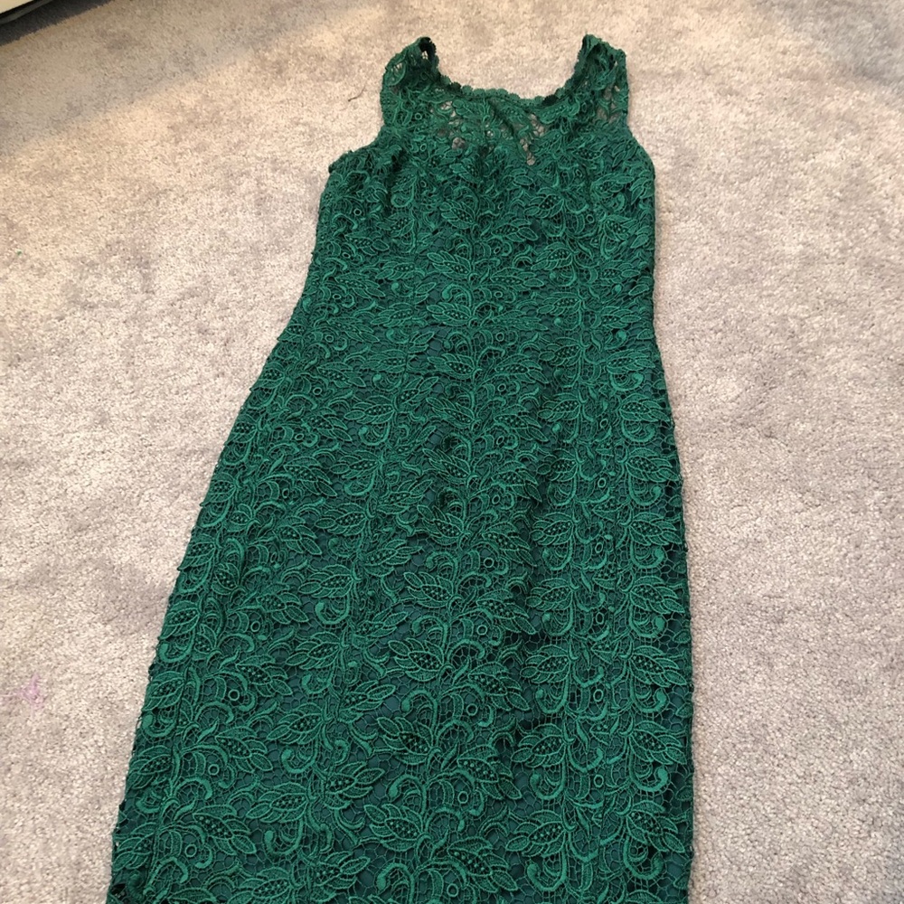 Green lace dress hits just below the knees
